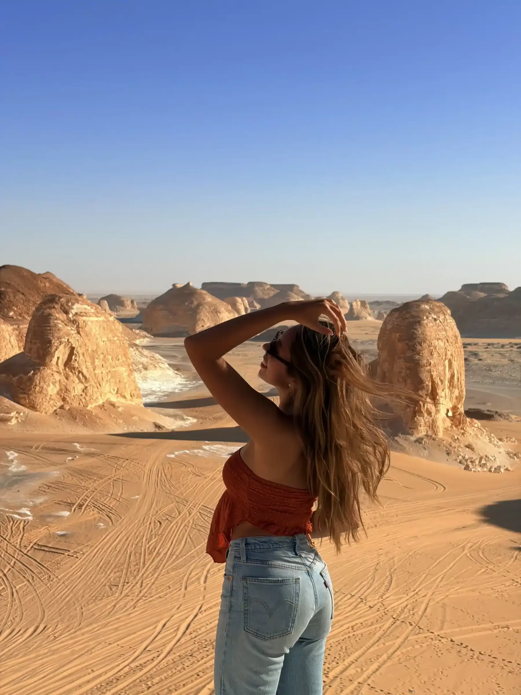 Traveler overlooking Agabat Valley during the four day White Desert total solar eclipse tour 2027