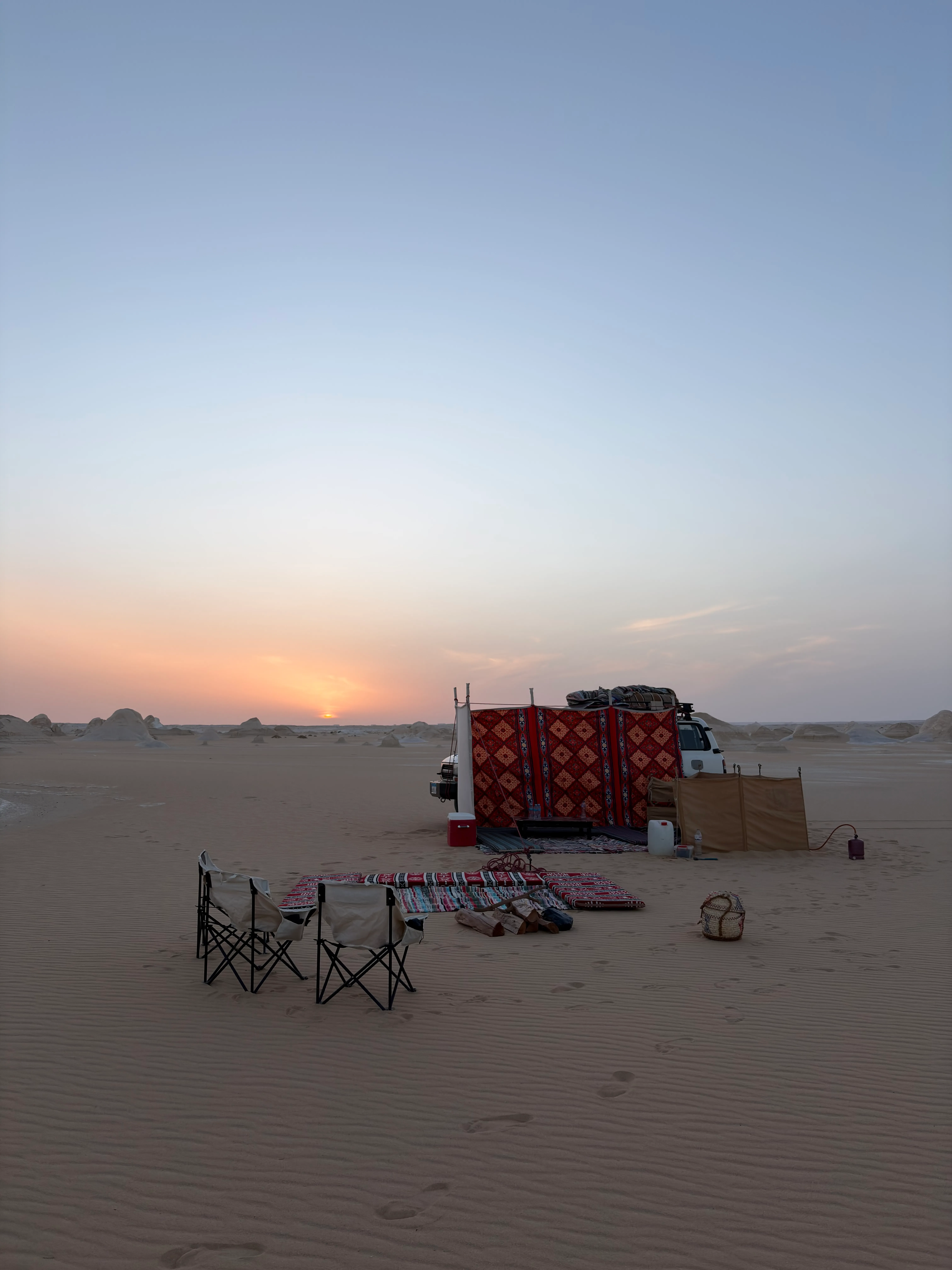 White Desert sunset camp seating prepared for the 2027 total solar eclipse experience